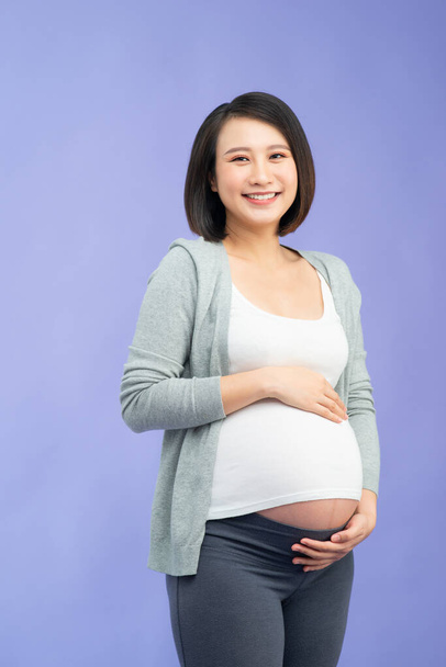 young pretty asian woman pregnant happy smiling - 写真・画像