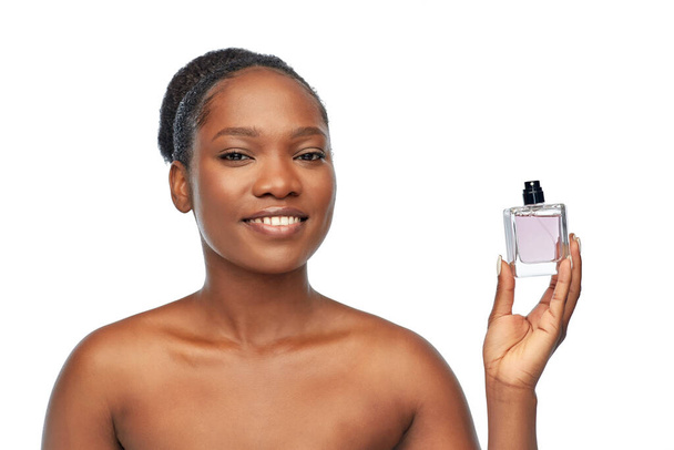 young african american woman with perfume - Foto, Imagem