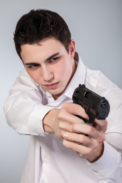 Man with a gun - Foto, Imagen