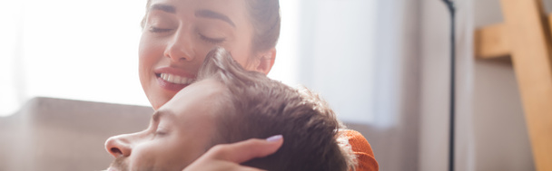 tender, smiling woman touching head of beloved man with closed eyes, banner - Foto, imagen