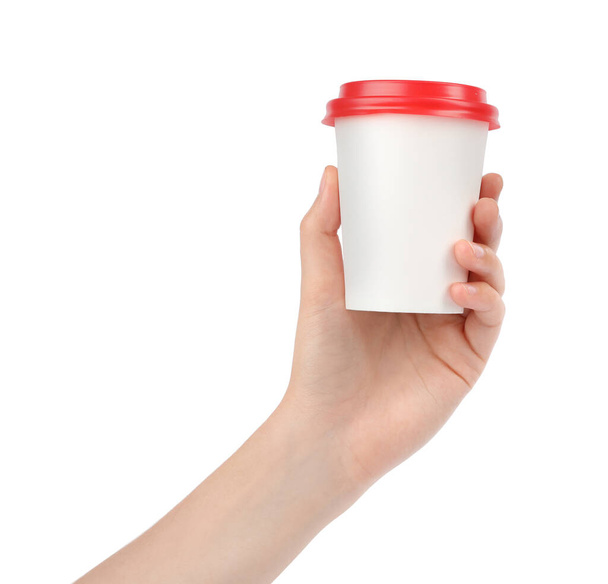 Woman holding takeaway paper coffee cup on white background, closeup - Foto, afbeelding