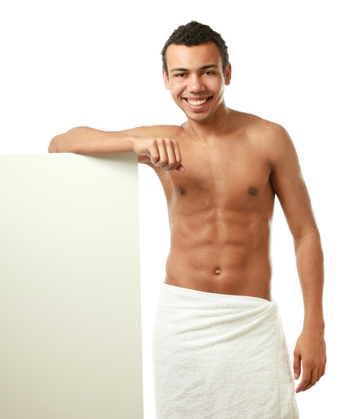 man covering himself with a towel and blank - Φωτογραφία, εικόνα
