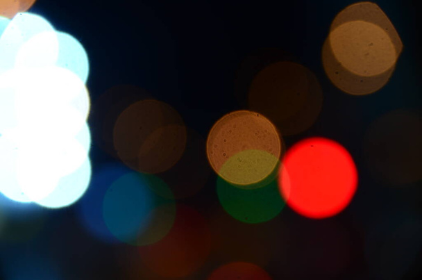 luces abstractas borrosas fondo de la ciudad en la noche - Foto, Imagen