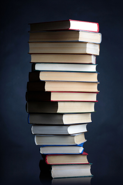 Pile of books on a black background - Photo, Image