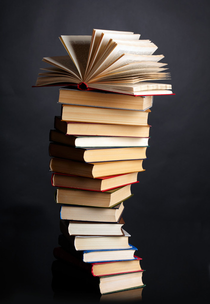 Pile of books on a black background - Photo, image