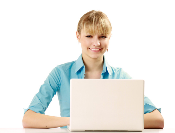 Woman sitting at a laptop computer - Foto, Imagem
