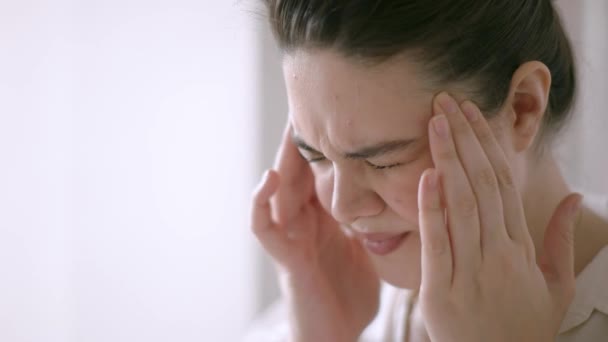 Woman with headache. Close up. At home or at work. - Footage, Video