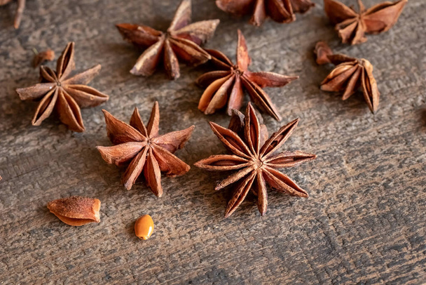 Star anise on a wooden table, closeup - Photo, Image