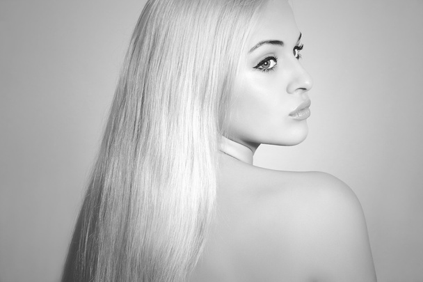 Beautiful Woman with Magnificent Hair. Beauty Sexy Blond Girl. Monochrome - Fotó, kép