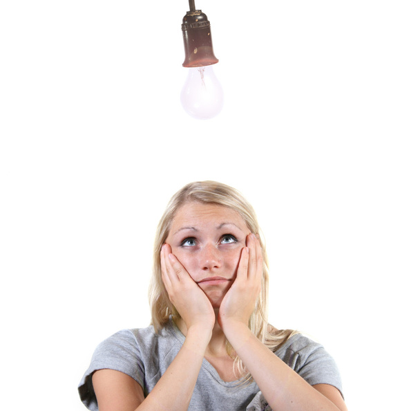 Woman with light bulb above her head - Photo, Image