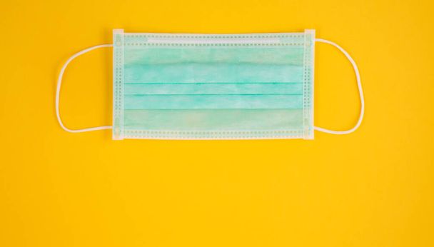 Group Doctor mask and coronavirus protection isolated on a color background - Foto, imagen