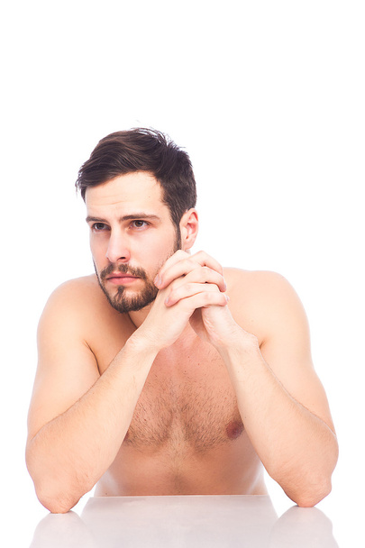 concerned man without shirt - 写真・画像