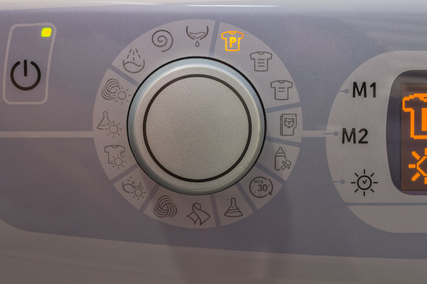 Fechar o botão da máquina de lavar roupa 3
 - Foto, Imagem