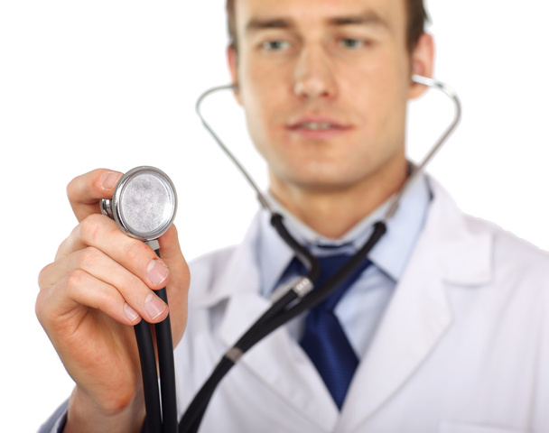Doctor using his stethoscope - Foto, afbeelding