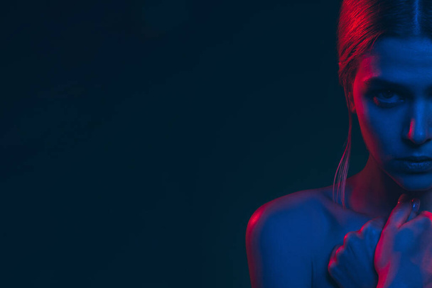 female silhouette neon light portrait scared woman - Photo, Image