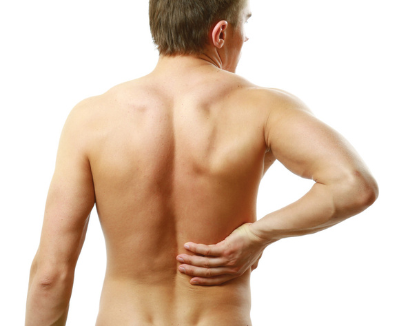 Young man with back pain - Photo, image