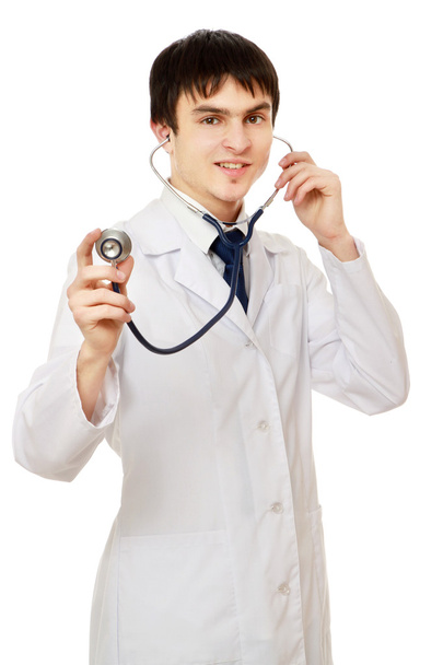 Young male doctor listening - Фото, зображення