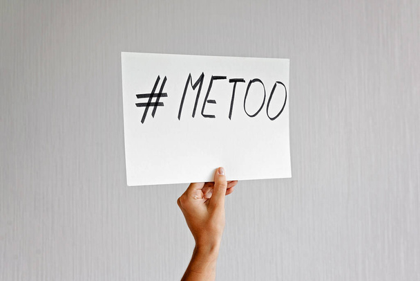 Young woman holding sign with metoo hashtag text. Sexual abuse, equal gender right.  - Foto, Imagem