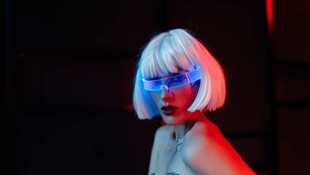 Futuristic style. Cyberpunk woman. - Photo, image