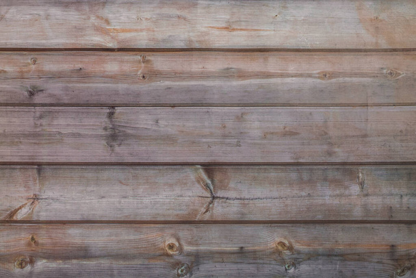 Vintage Wood Background Texture. Natural brown barn wood floor / wall texture background pattern. Wood planks / boards are very old with a beautiful rustic look / style. - Photo, Image