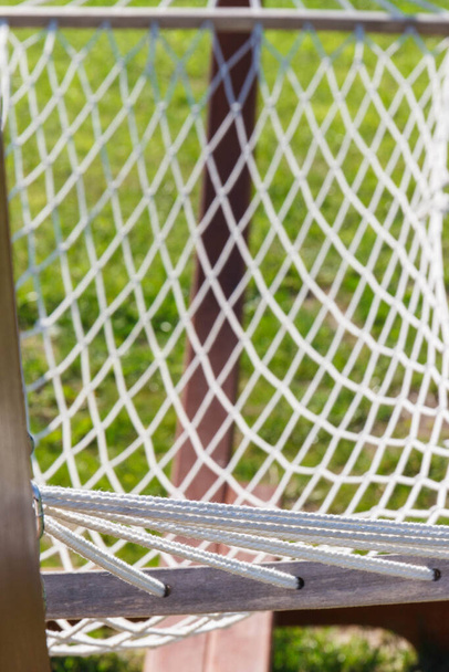 Grid rope as detail and part of hammock. Vacation and summer time - Fotoğraf, Görsel