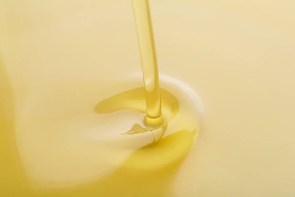 Pouring of fresh olive oil, closeup - Fotoğraf, Görsel