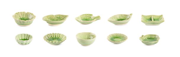 Green handmade pottery cup on white background. clipping path - Foto, imagen