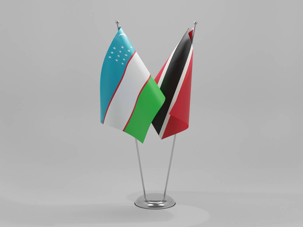 Trinidad y Tobago - Banderas de cooperación de Uzbekistán, fondo blanco - 3D Render - Foto, Imagen