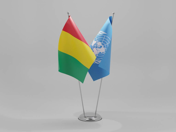 国連-ギニア協力旗、白の背景- 3Dレンダリング - 写真・画像