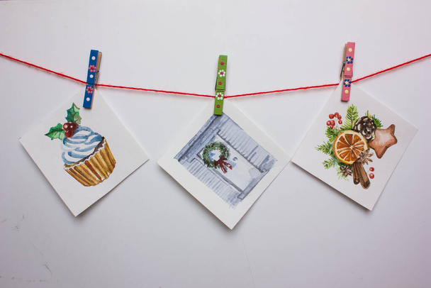 Χριστουγεννιάτικες νερομπογιές που απομονώνονται σε ένα λευκό: cupcake, ελάφι, πορτοκάλι, μπισκότο. - Φωτογραφία, εικόνα