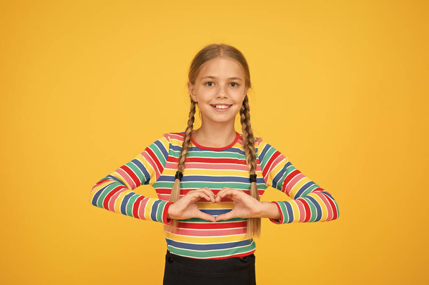 I love you with all my heart. Happy girl share love. Little child show hand heart gesture. Happy valentines day. Love confession. Fall in love - Foto, imagen