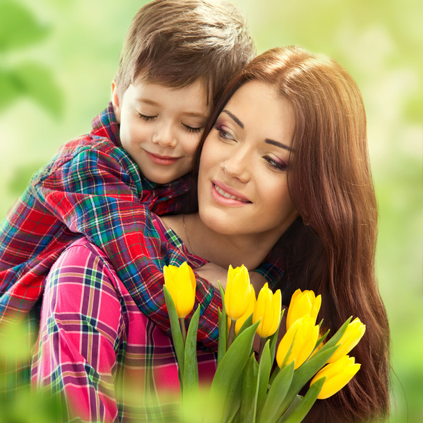 Spring portrait of mother and son on Mothers Day - Photo, Image