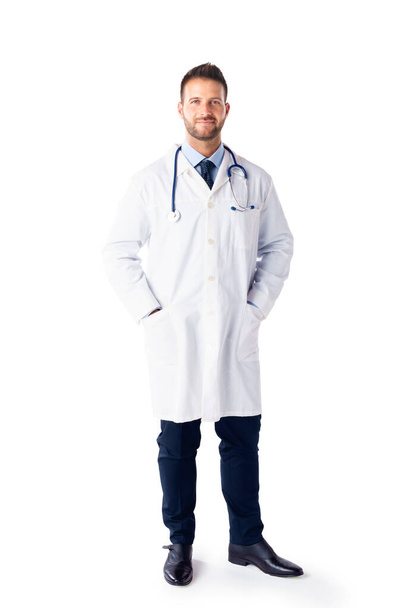 Full length shot of male doctor standing at isolated white background with copy space.  - Фото, зображення