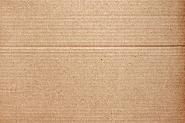 Fondo abstracto de la hoja de cartón marrón, textura de la caja de papel reciclado en viejo patrón vintage para la obra de arte de diseño. - Foto, Imagen