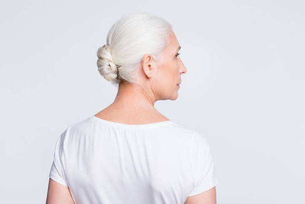 Bcak rear profile side photo of serious lady staring wearing t-shirt isolated over white background - Fotografie, Obrázek