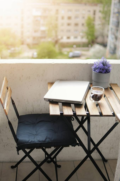 Cozy working place outside. Morning routine at the balcony. Home education.  - Photo, Image