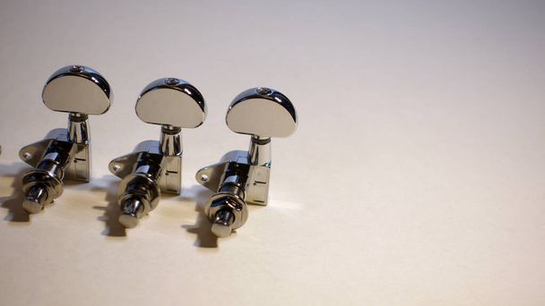 guitar tuning pegs . Color background , Copy space - Photo, image