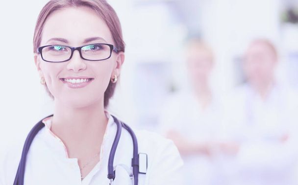 Portrait of woman doctor standing at hospital - Foto, Imagen