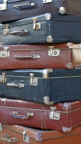 Pile of colorful vintage suitcases - Valokuva, kuva
