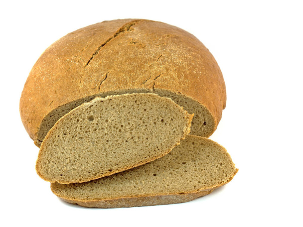 Viipaloitu leipä valkoisen taustan edessä - Valokuva, kuva