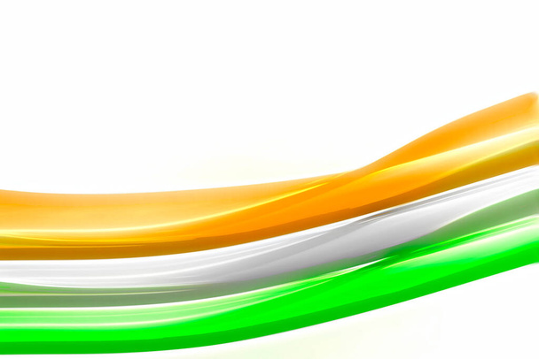 An abstract image of glossy Indian flag tricolor on isolated white background. - Photo, Image