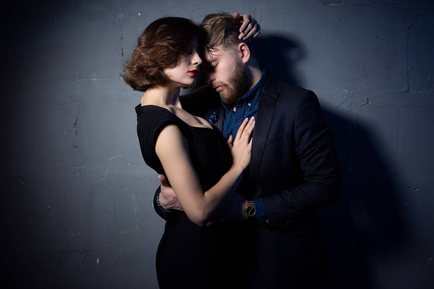 Fashion photo of sexy elegant couple in the tender passion - Zdjęcie, obraz