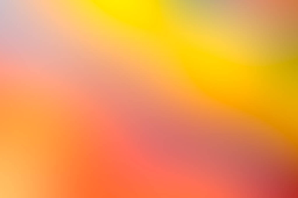 Різнокольоровий золотистий помаранчевий розмитий фон
. - Фото, зображення