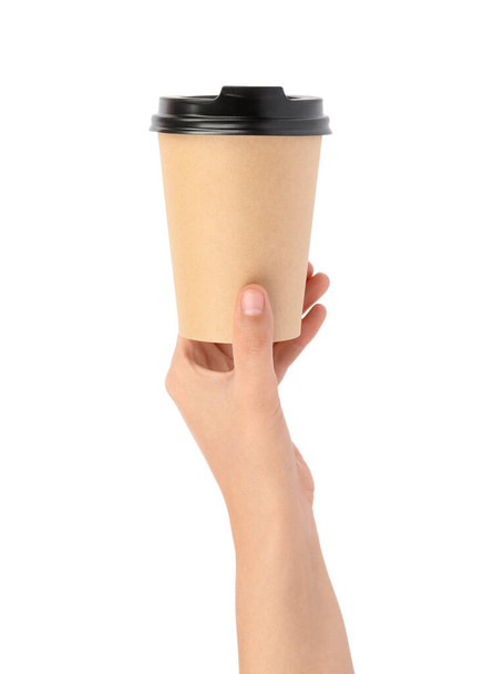 Woman holding takeaway paper coffee cup on white background, closeup - Zdjęcie, obraz