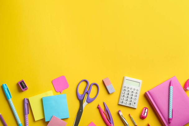 School stationery on yellow background, flat lay with space for text. Back to school - Foto, imagen