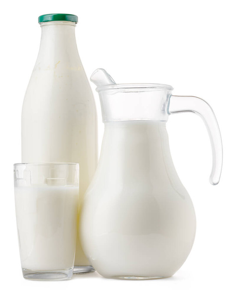 Glassware full of fresh milk isolated on white - Фото, изображение
