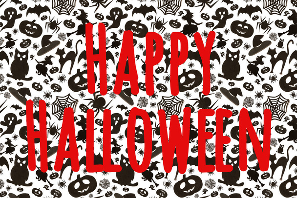 Happy helloween text on abstract holydays pattern in cartoon style on white background. Paper art. Hallowen holiday concept. - Foto, immagini