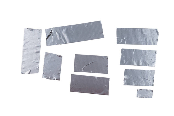 Cinta adhesiva escocesa de plata aislada sobre fondo blanco. Vista superior.  - Foto, Imagen