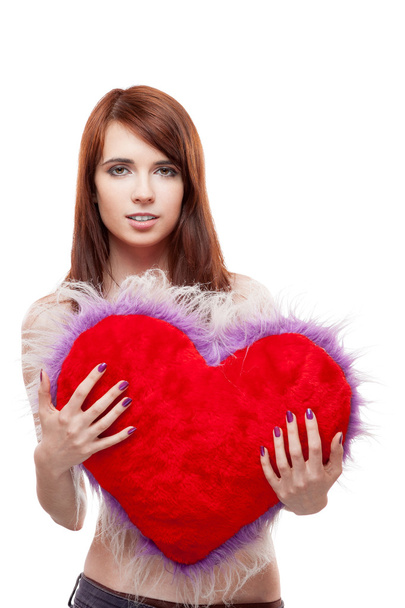 girl holding fur red heart - 写真・画像