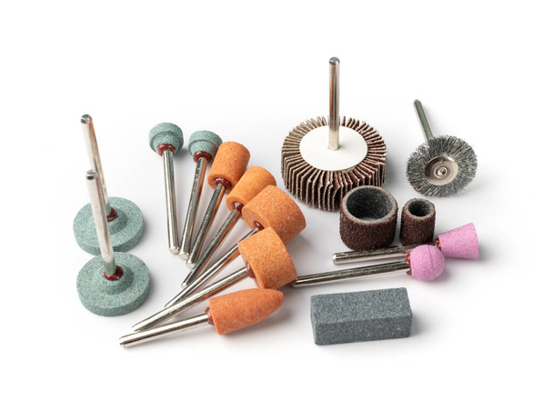 Polishing tools set for sander tool. Mini drill accessories with grinding polishing wheels, abrasive discs, sandpapers, sander tool collection, emery paper, small abrasive equipment - Photo, Image